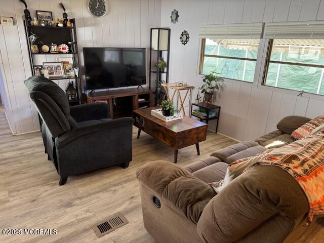 127 Lane B Hazlet, NJ 07730 - Photo 6 of 13 a living room with furniture and a flat screen tv