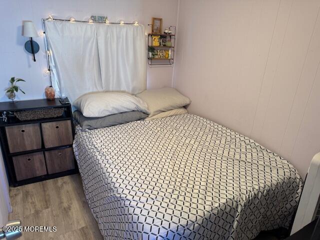 127 Lane B Hazlet, NJ 07730 - Photo 8 of 13 a bedroom with bed and wooden floor