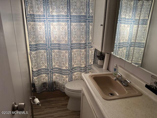 127 Lane B Hazlet, NJ 07730 - Photo 9 of 13 a bathroom with a sink a toilet and a shower