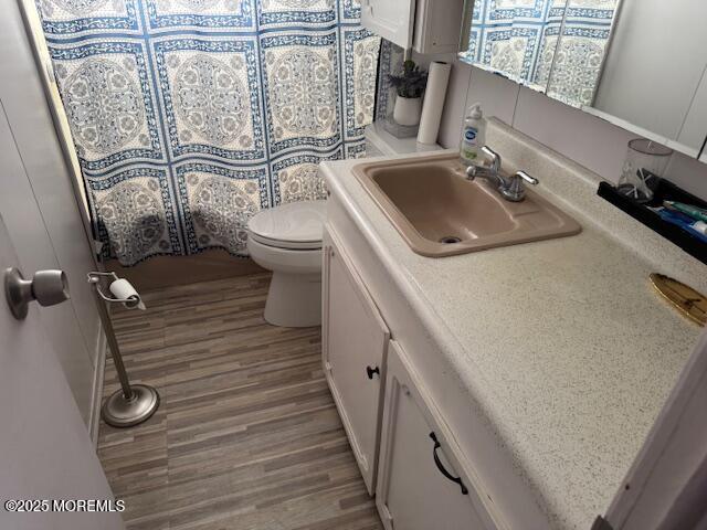 127 Lane B Hazlet, NJ 07730 - Photo 10 of 13 a bathroom with a sink and toilet