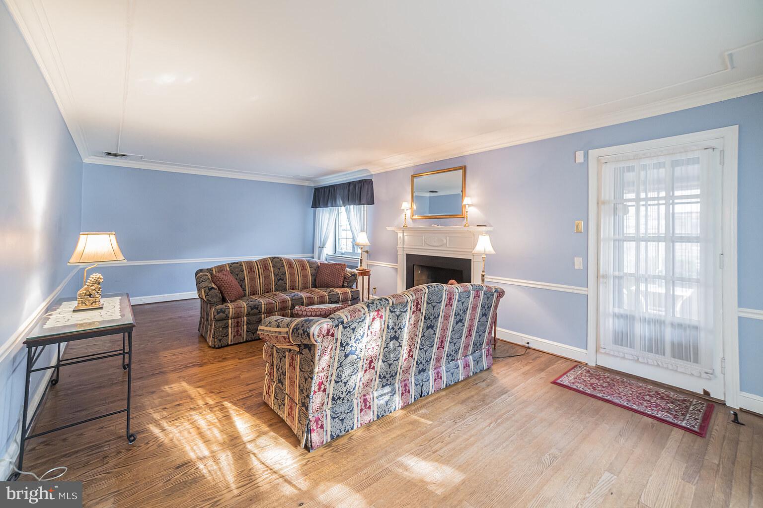 463 Derwyn Road Drexel Hill, PA 19026 - Photo 4 of 23 Living room featuring gas fireplace