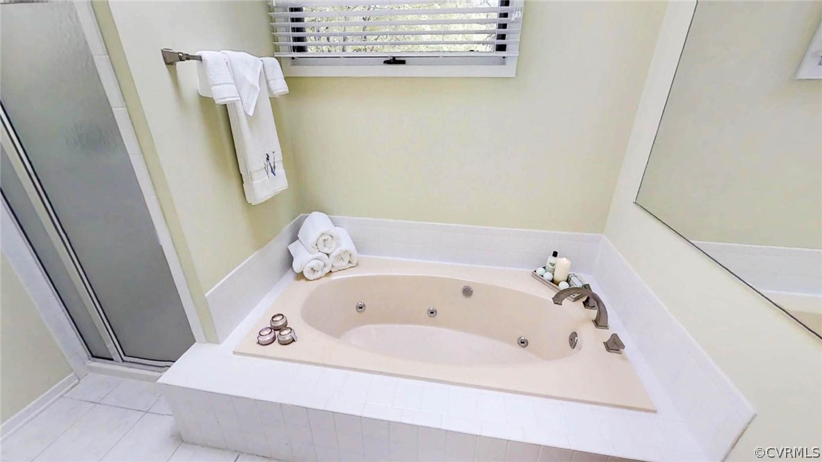 14102 Spring Gate Road Midlothian, VA 23112 - Photo 12 of 19 a bathroom with a bathtub