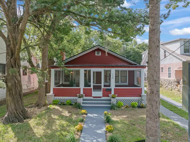 front view of a house with a yard