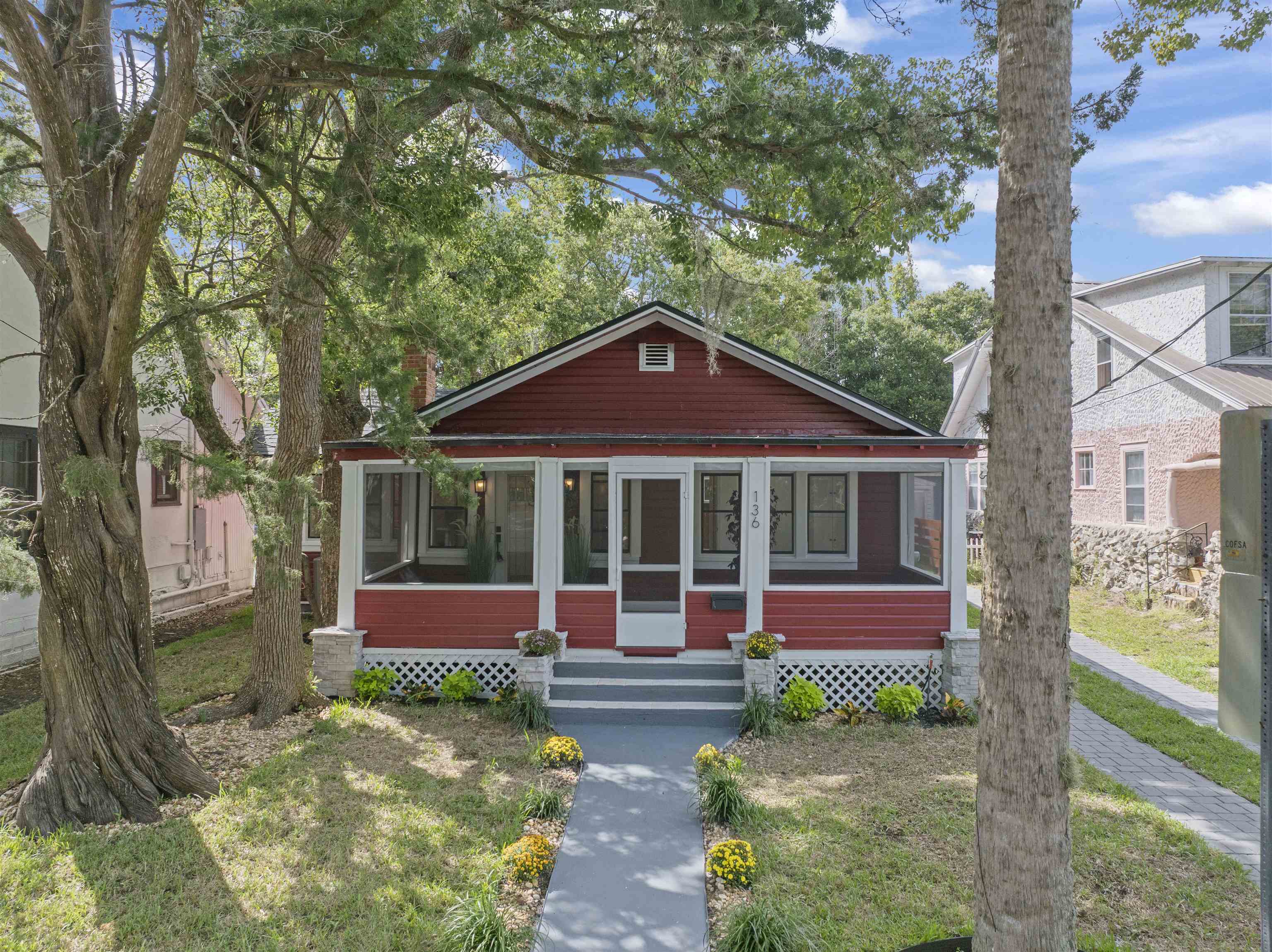 136 Washington Street St. Augustine, FL 32084 - Photo 3 of 50 front view of a house with a yard