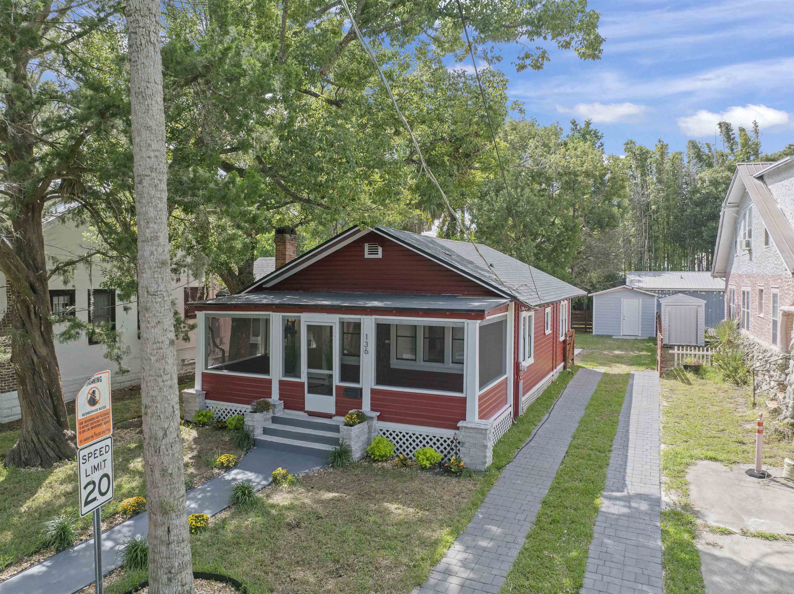 136 Washington Street St. Augustine, FL 32084 - Photo 41 of 50 a front view of a house with a yard
