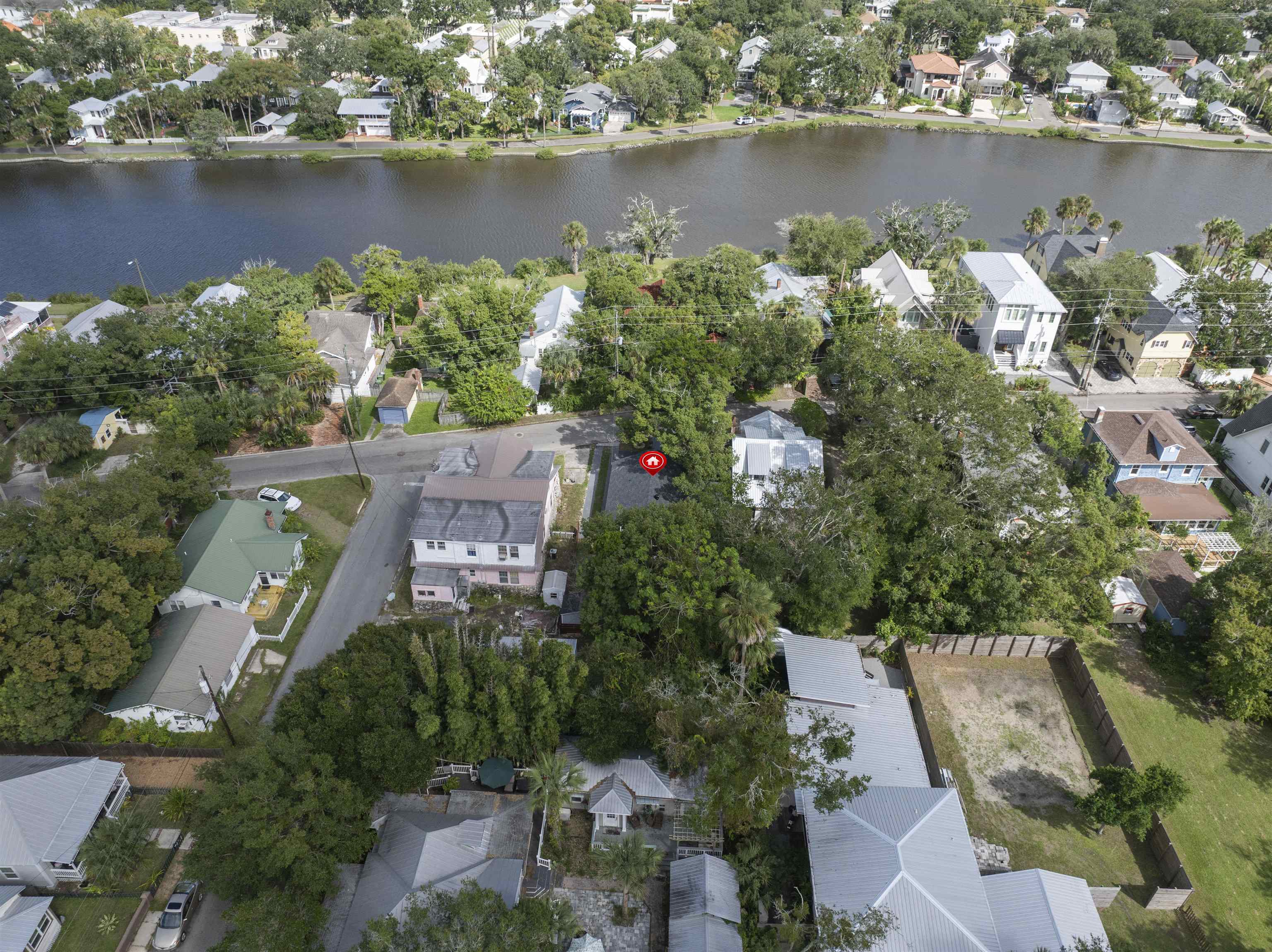 136 Washington Street St. Augustine, FL 32084 - Photo 45 of 50 an aerial view of lake and residential houses with outdoor space and lake view