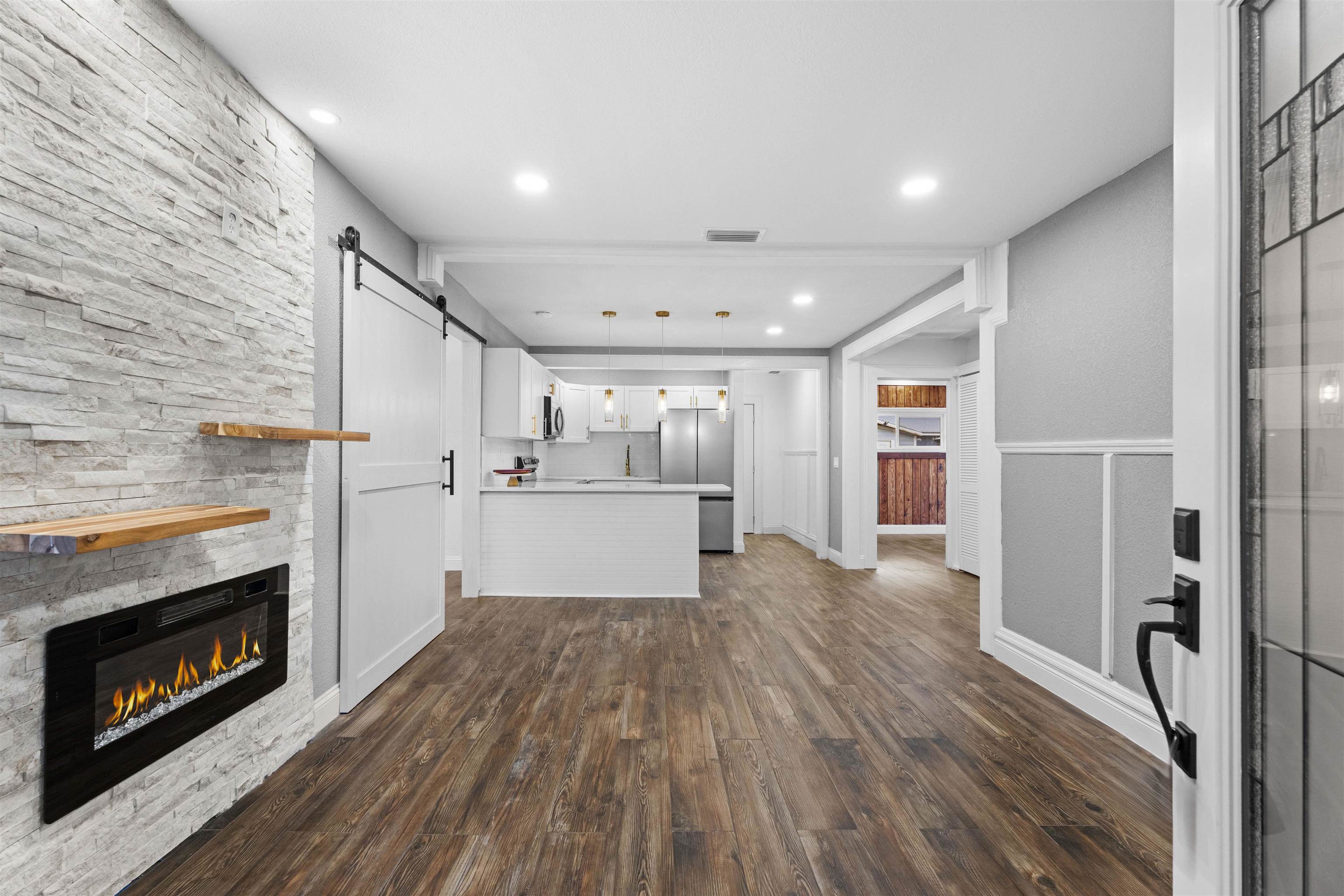 136 Washington Street St. Augustine, FL 32084 - Photo 8 of 50 a view of kitchen with furniture and fireplace