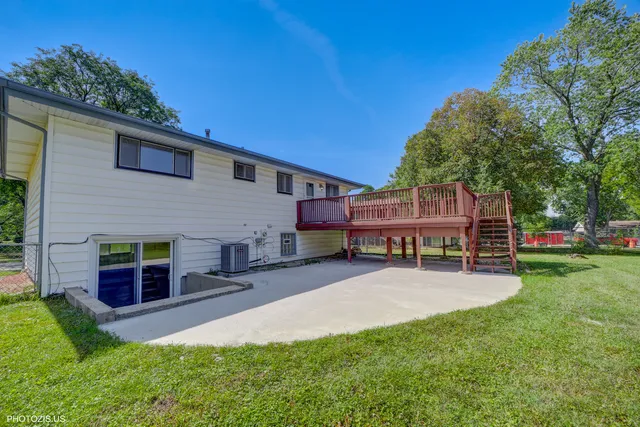 a house view with a sitting space and garden