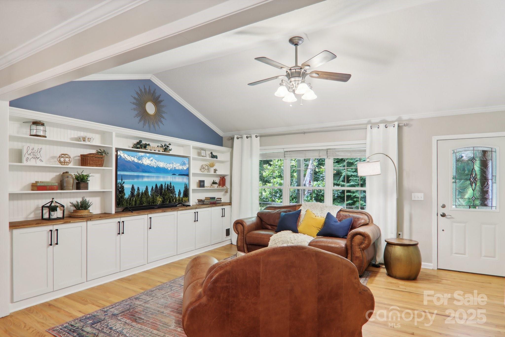 33 Warlick Road Mills River, NC 28759 - Photo 14 of 48 a living room with furniture and a flat screen tv