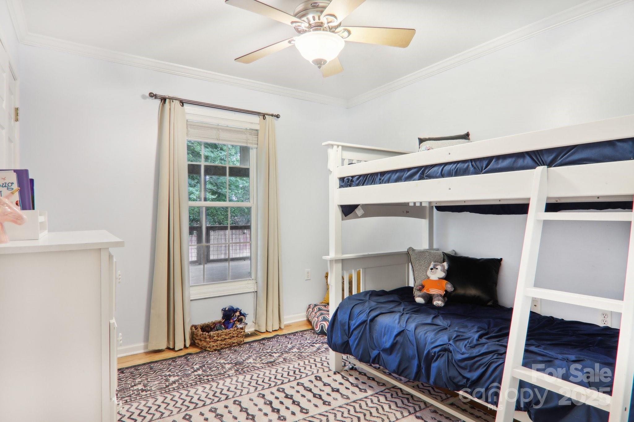 33 Warlick Road Mills River, NC 28759 - Photo 35 of 48 a bedroom with a bed and a window