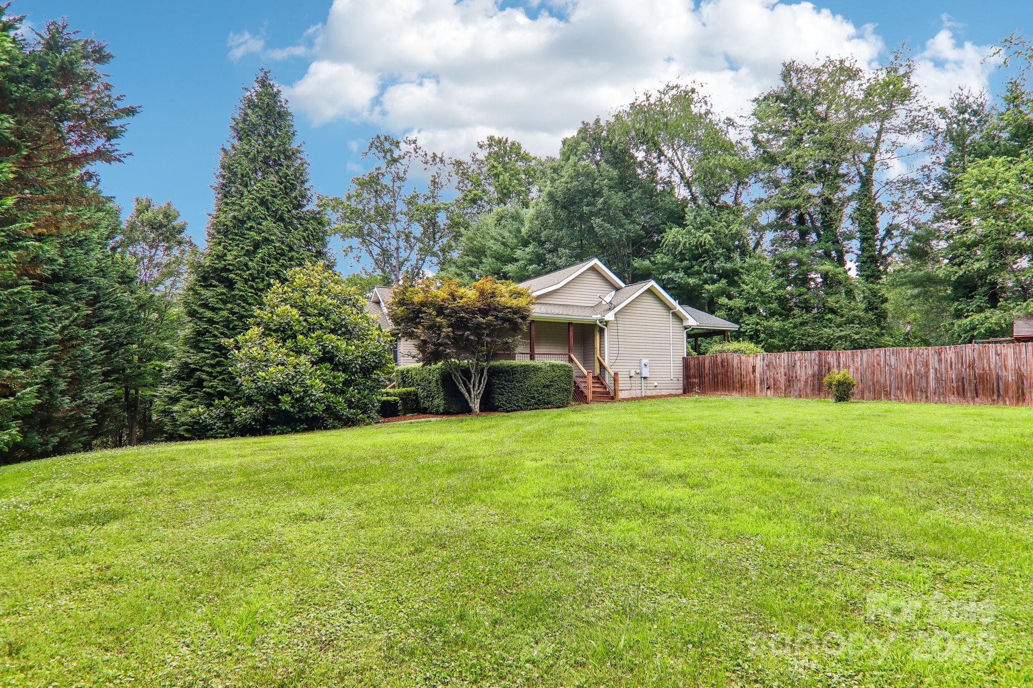 33 Warlick Road Mills River, NC 28759 - Photo 43 of 48 a view of a house with backyard and garden
