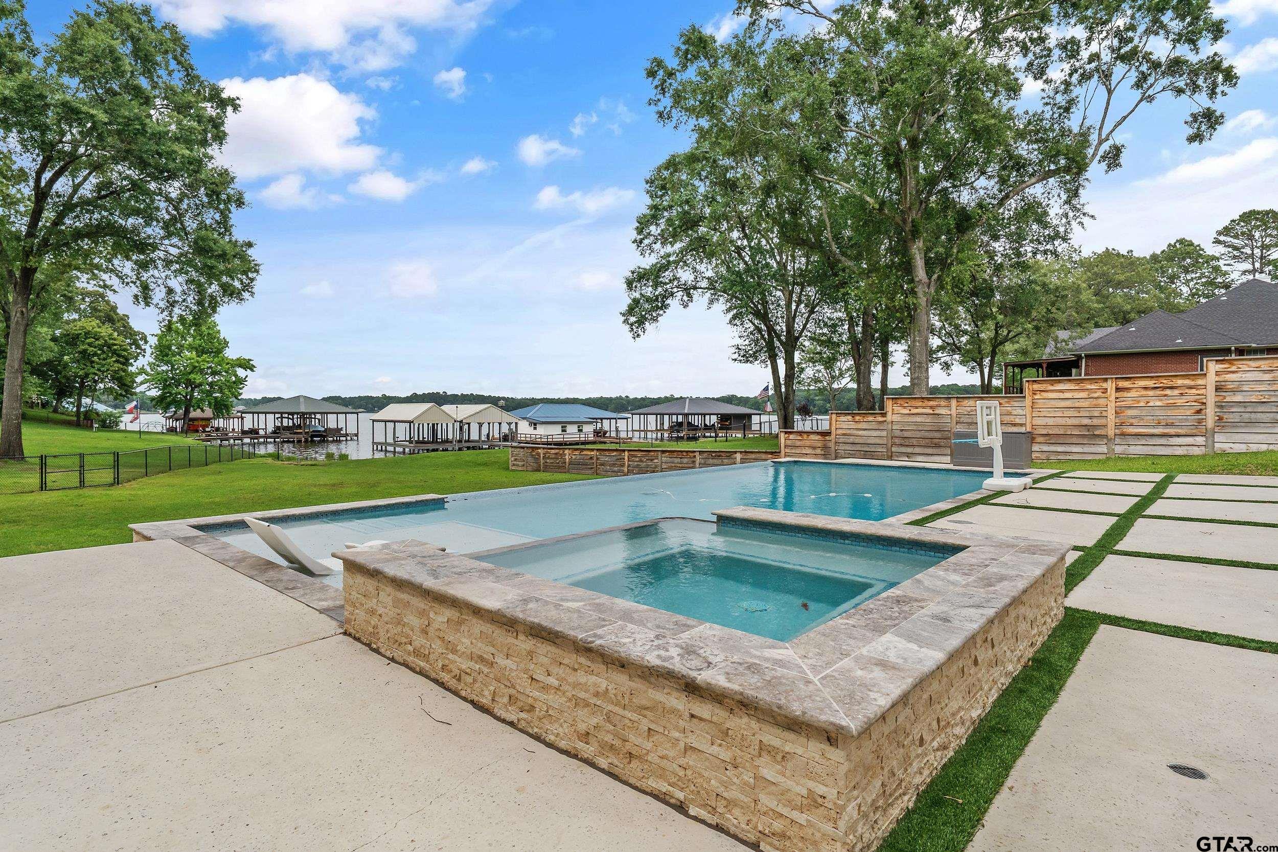 16837 Wilson Road Tyler, TX 75707 - Photo 37 of 44 a view of a swimming pool from a terrace