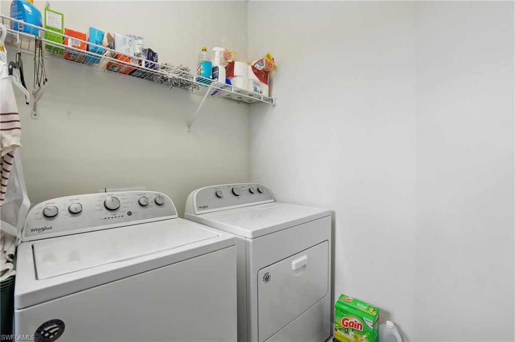 4934 Seton Way Ave Maria, FL 34142 - Photo 31 of 49 a utility room with dryer and washer