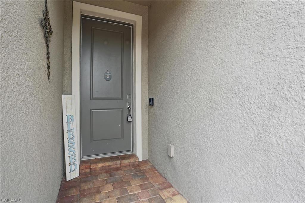 4934 Seton Way Ave Maria, FL 34142 - Photo 34 of 49 a view of a hallway