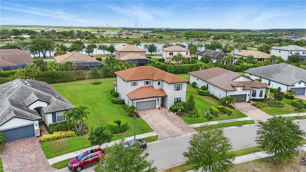 4934 Seton Way Ave Maria, FL 34142 - Photo 42 of 49 an aerial view of a house with a garden