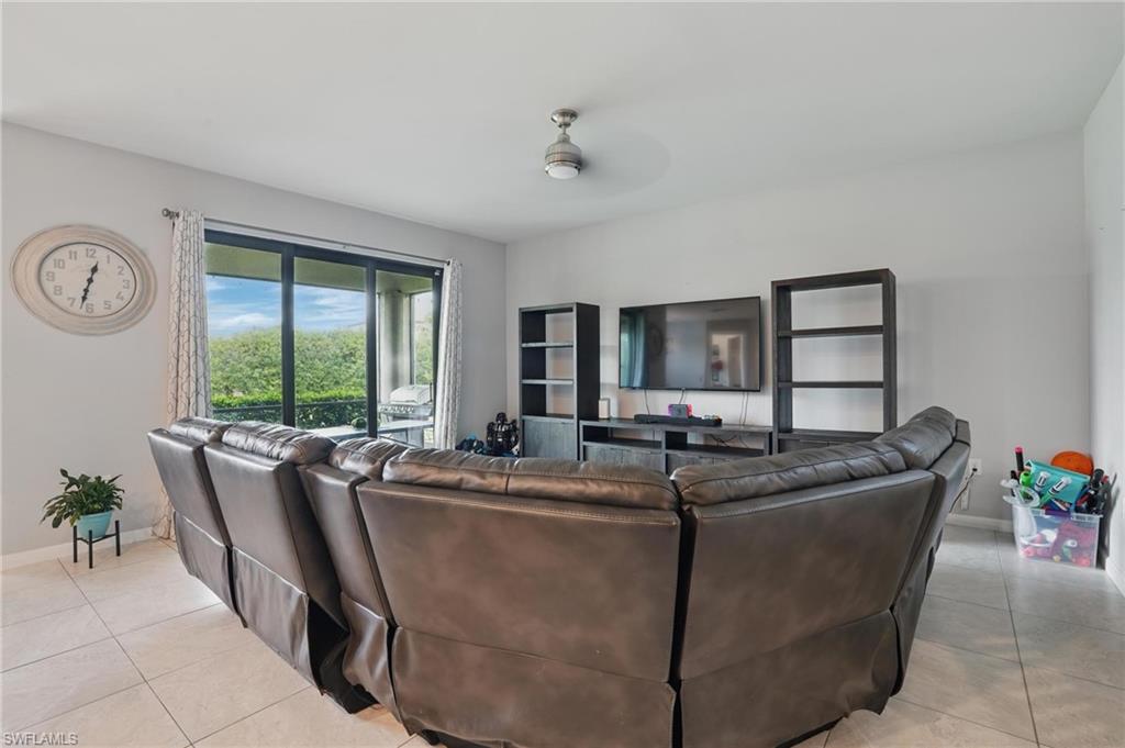 4934 Seton Way Ave Maria, FL 34142 - Photo 7 of 49 a living room with furniture and window