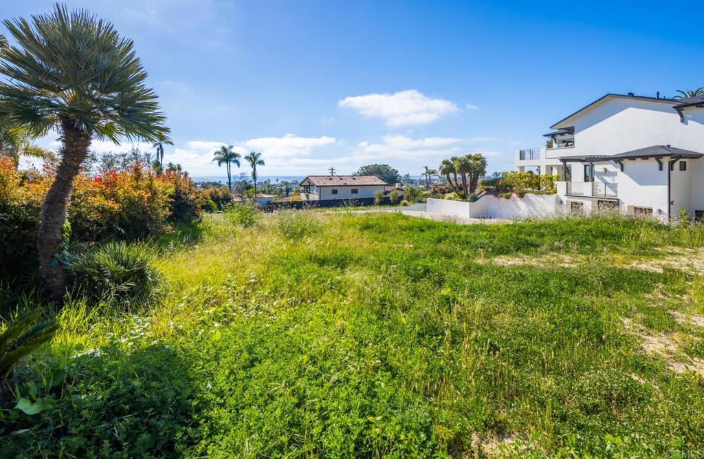 397 Sunset Drive Encinitas, CA 92024 - Photo 12 of 15 a view of a lake with a garden