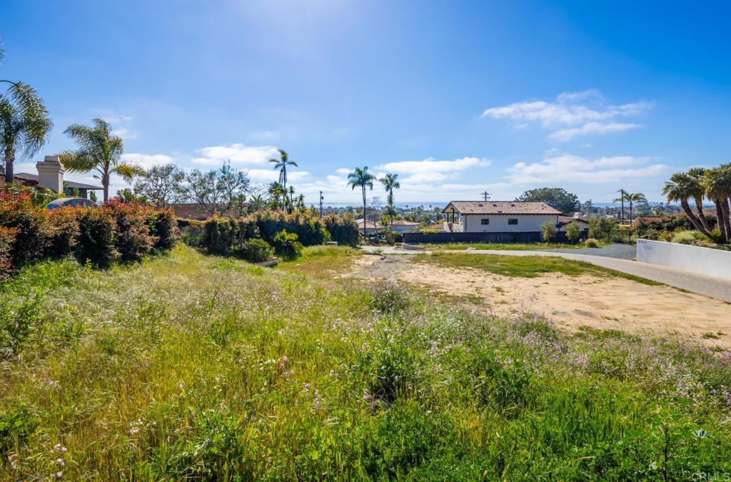 397 Sunset Drive Encinitas, CA 92024 - Photo 13 of 15 a view of a lake with houses