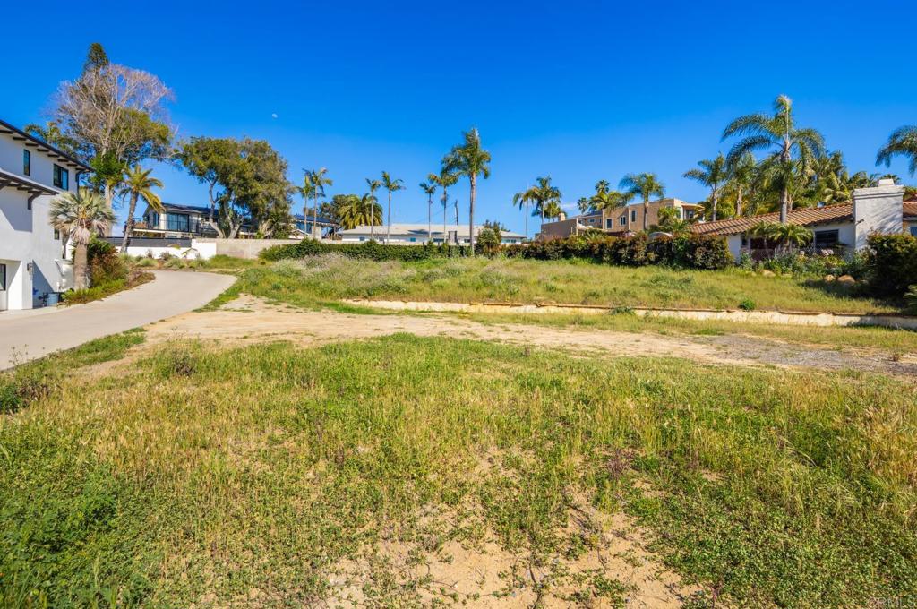 397 Sunset Drive Encinitas, CA 92024 - Photo 14 of 15 a view of a lake with a building in the background