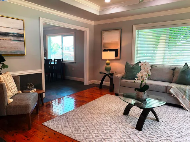 a bathroom with a sink a mirror and a toilet