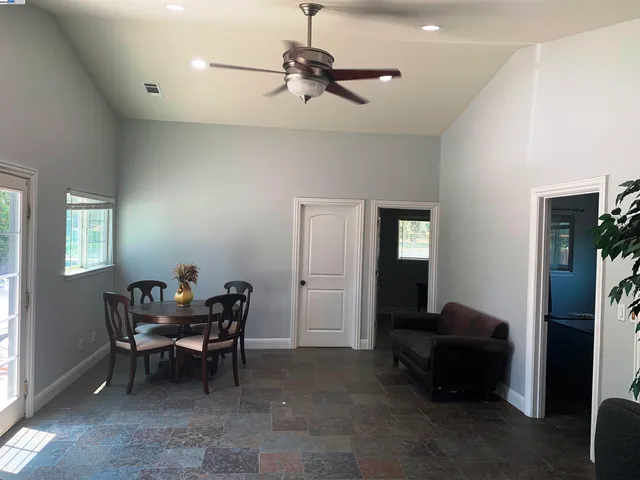 a view of a yard with an outdoor space