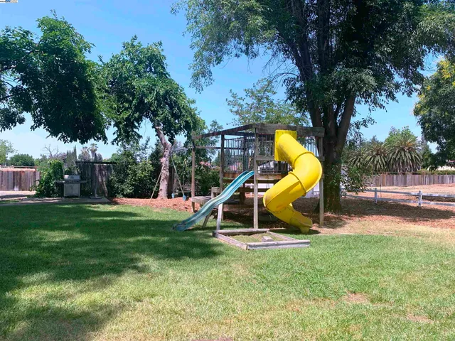 a view of a park with swings