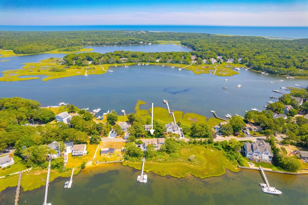 265 Monomoscoy Road Mashpee, MA 02649 - Photo 3 of 39 a view of an ocean from a building