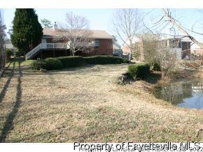 5018 Summer Ridge Road Fayetteville, NC 28303 - Photo 10 of 10 a view of a yard