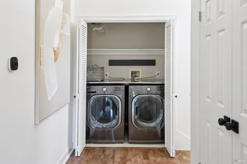 a bathroom with a tub and sink