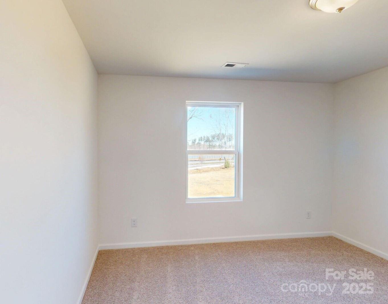 1829 Augustine Street Monroe, NC 28112 - Photo 15 of 21 an empty room with a window