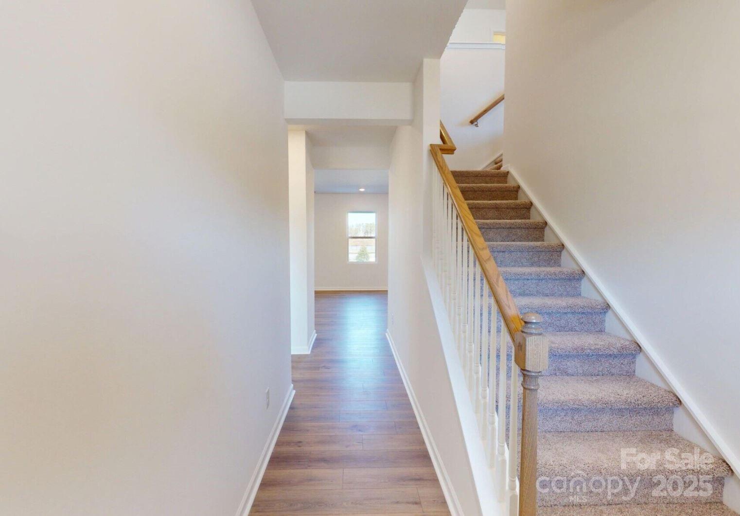 1829 Augustine Street Monroe, NC 28112 - Photo 2 of 21 a view of a hallway with wooden floor and entryway