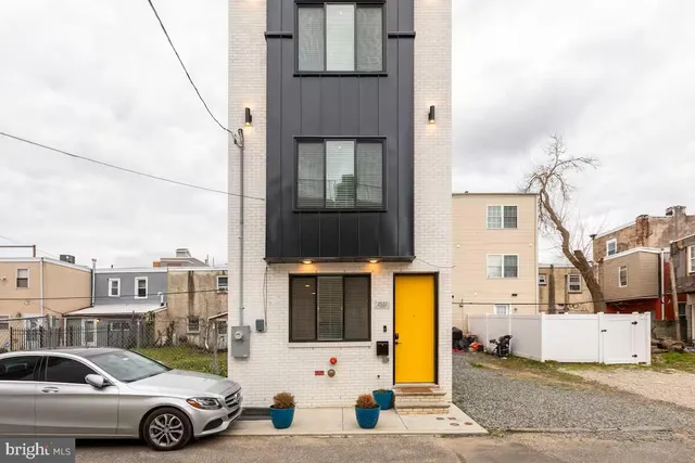 a car parked in front of a building