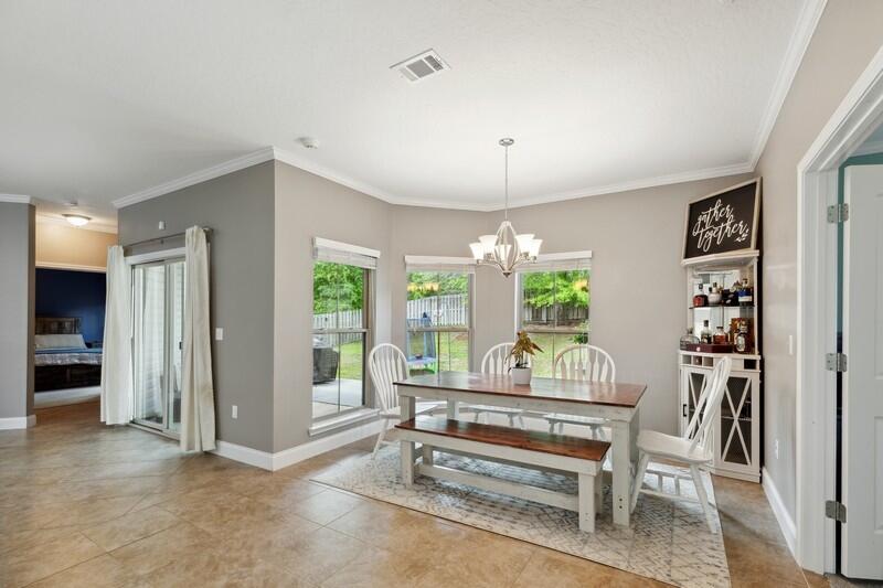 4542 Annabelle Lane Crestview, FL 32539 - Photo 18 of 36 workspace with wooden floor and windows