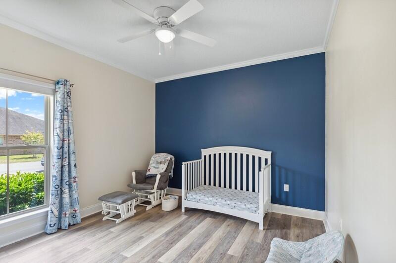 4542 Annabelle Lane Crestview, FL 32539 - Photo 20 of 36 a view of entryway with wooden floor