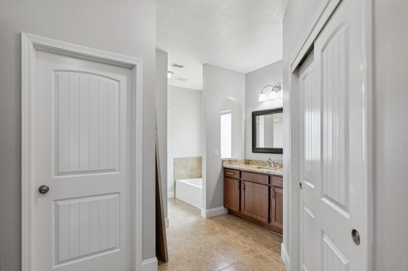 4542 Annabelle Lane Crestview, FL 32539 - Photo 28 of 36 a view of a kitchen from a hallway