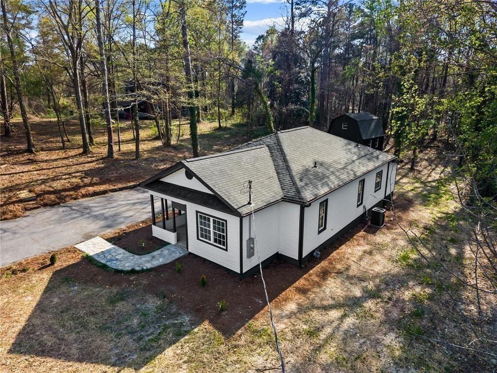 5580 Burrus Road Austell, GA 30106 - Photo 7 of 53 a view of a house with backyard