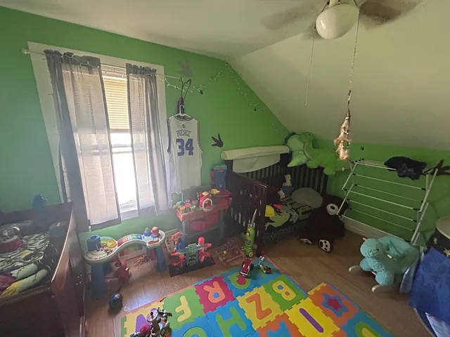 a bathroom with a toilet a sink and a shower