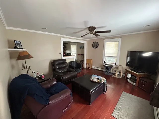 a kitchen with stainless steel appliances granite countertop a stove top oven a sink and a refrigerator