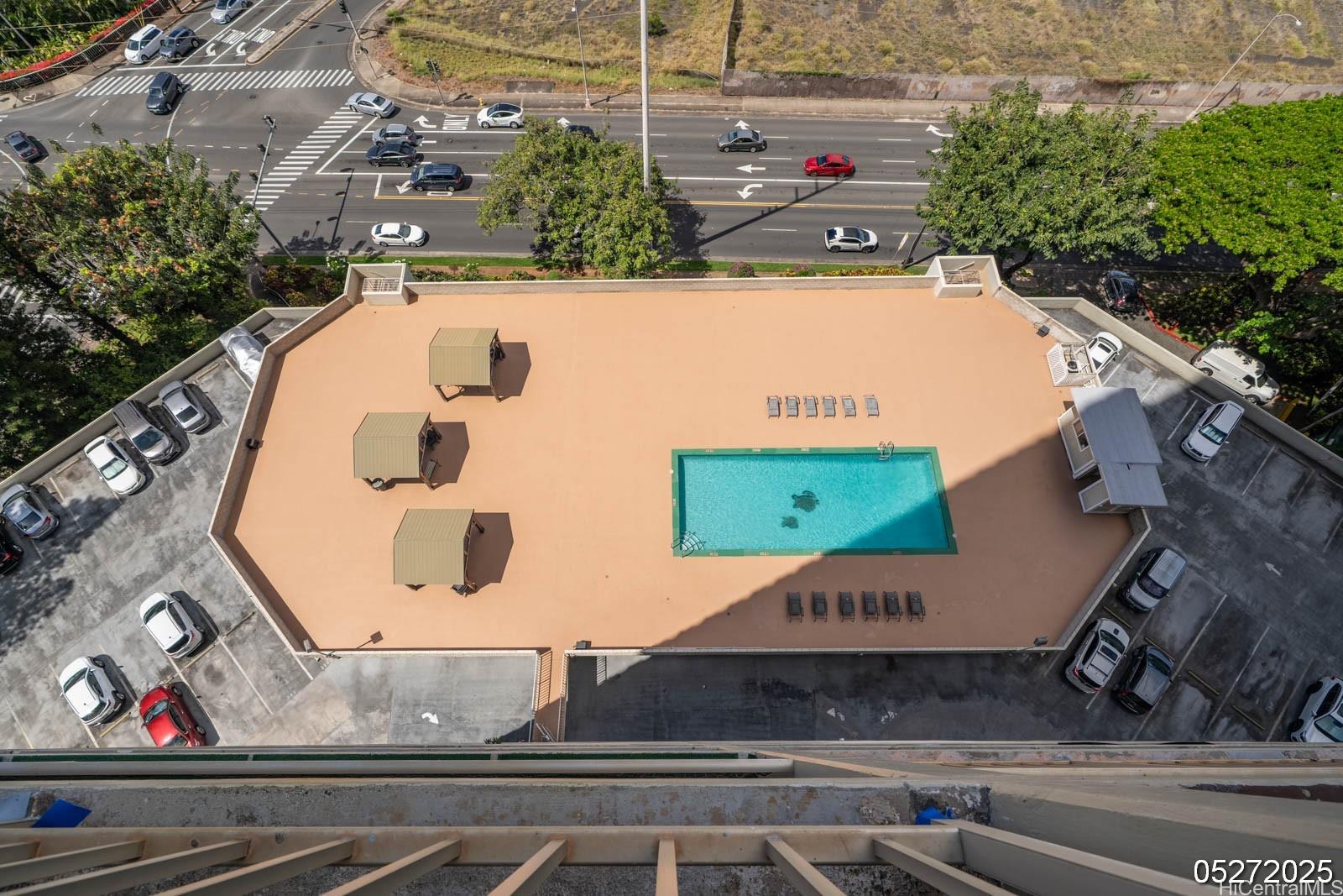 98-99 Uao Place, Unit 1705 Aiea, HI 96701 - Photo 10 of 25 an aerial view of a house with a yard and lake view