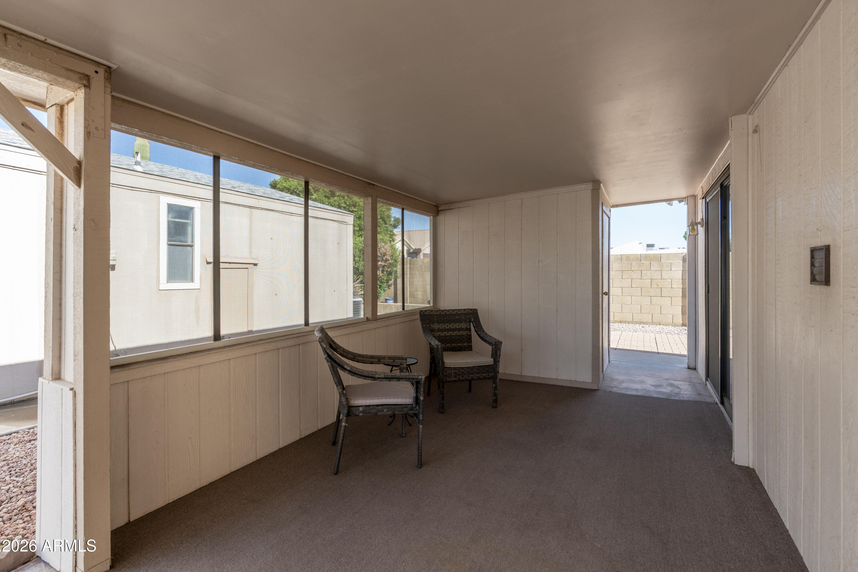 5735 East McDowell Road, Unit 466 Mesa, AZ 85215 - Photo 12 of 19 a view of a livingroom with furniture and staircase
