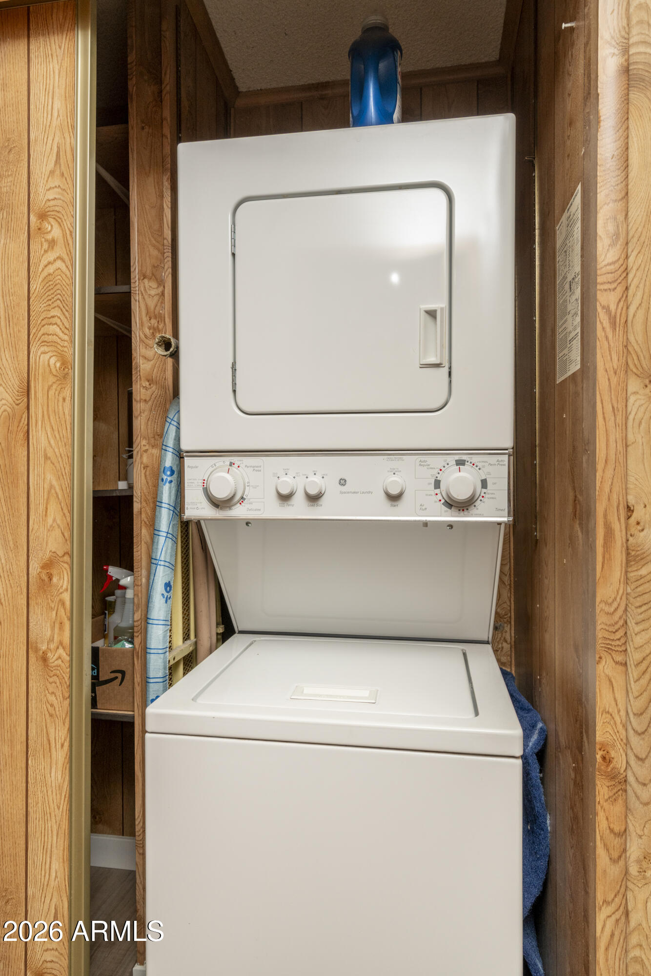 5735 East McDowell Road, Unit 466 Mesa, AZ 85215 - Photo 13 of 19 a utility room with dryer and washer