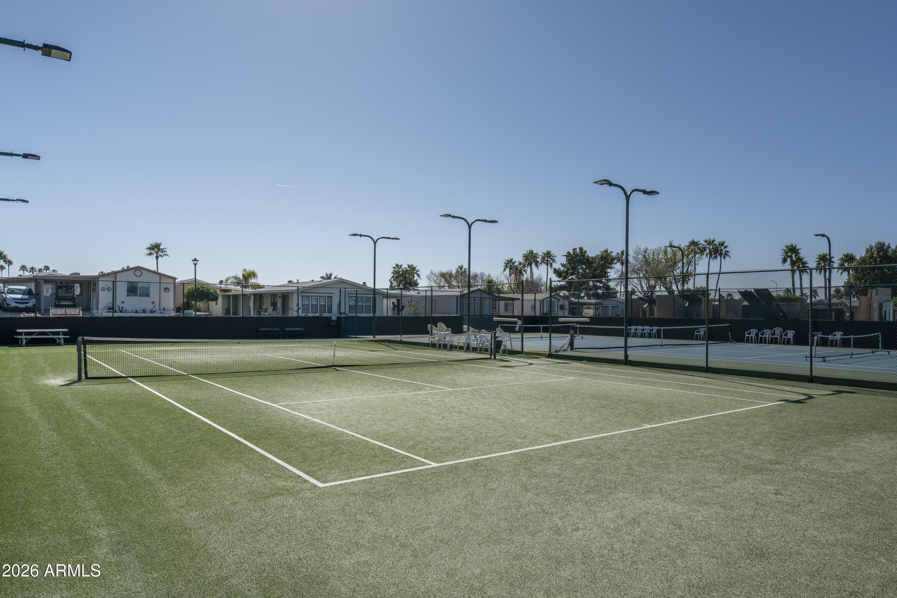 5735 East McDowell Road, Unit 466 Mesa, AZ 85215 - Photo 18 of 19 a view of a tennis court
