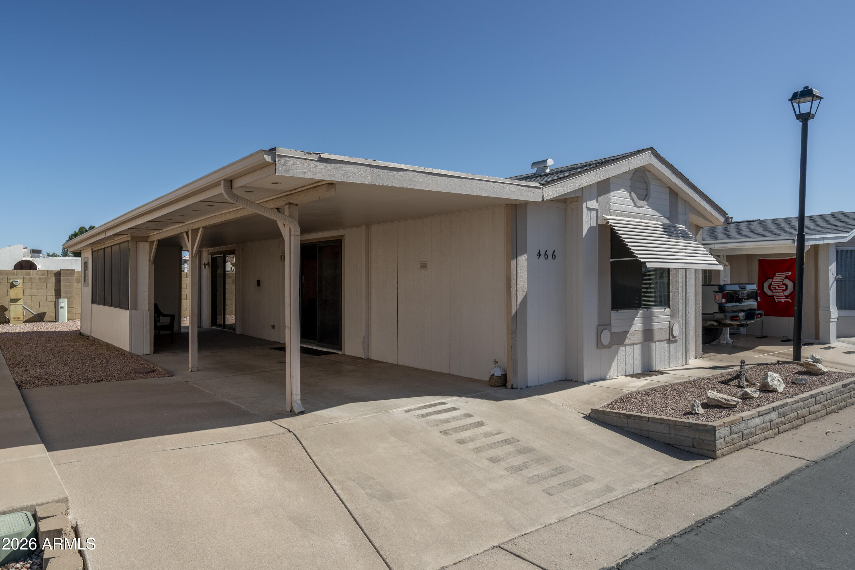 5735 East McDowell Road, Unit 466 Mesa, AZ 85215 - Photo 2 of 19 a front view of a house