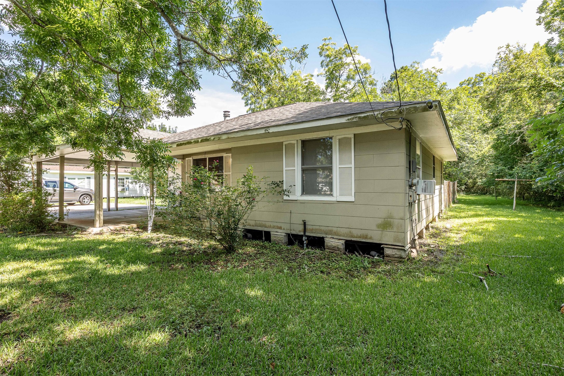 502 Massey Tompkins Road Baytown, TX 77521 - Photo 30 of 32 a front view of a house with a garden
