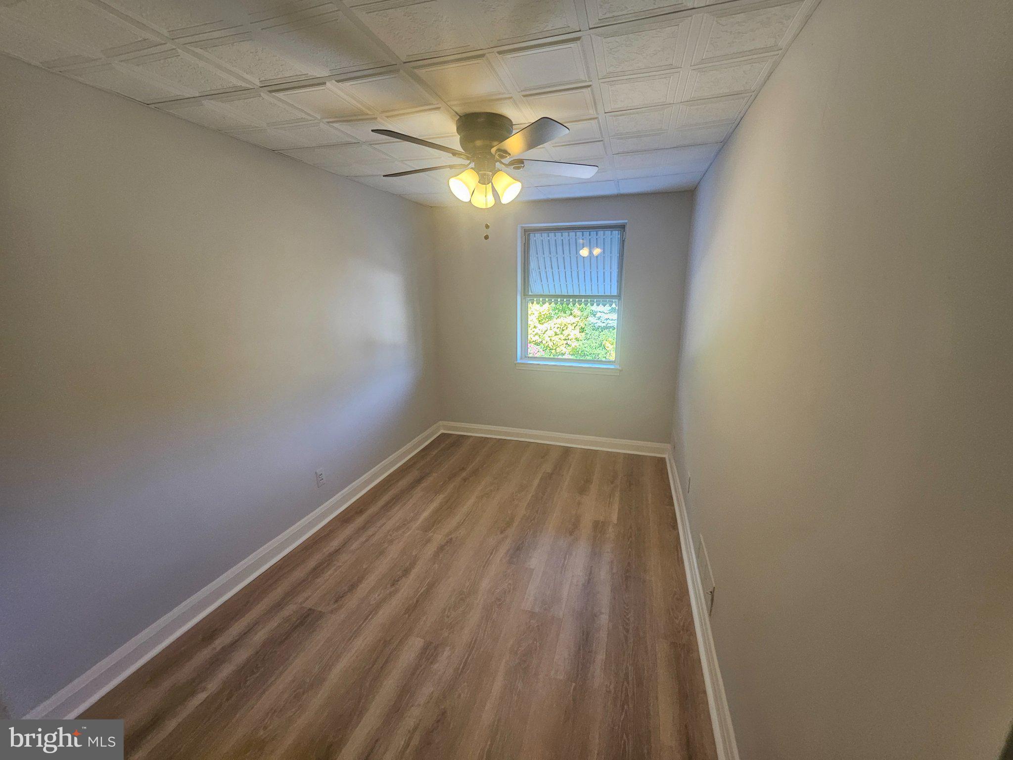 635 48th Street Baltimore, MD 21224 - Photo 10 of 14 Bright and airy room with natural light.