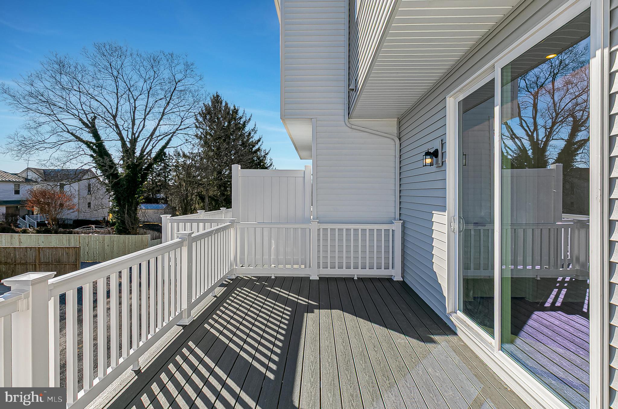 70 C Oasis Avenue Ranson, WV 25438 - Photo 22 of 41 a view of a balcony with wooden floor