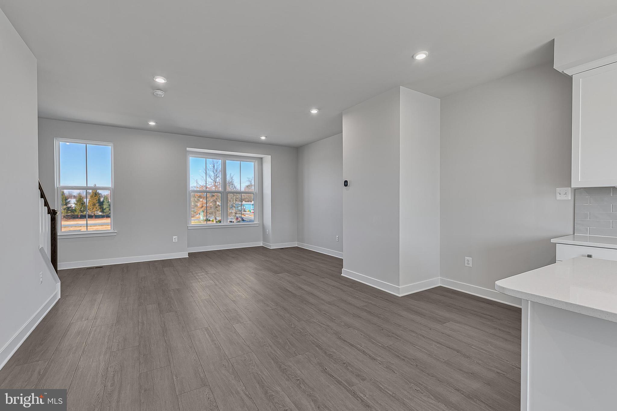 70 C Oasis Avenue Ranson, WV 25438 - Photo 25 of 41 a view of an empty room with wooden floor and a window