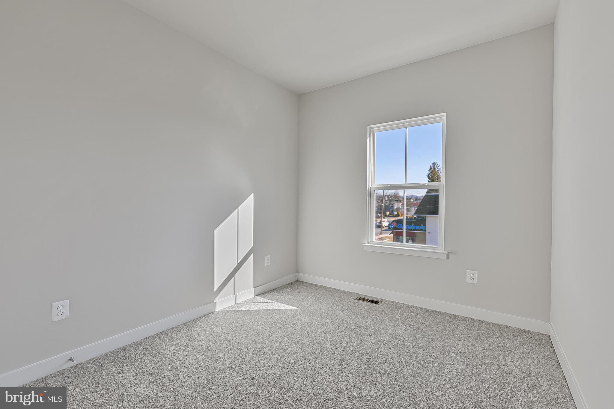 70 C Oasis Avenue Ranson, WV 25438 - Photo 29 of 41 a view of an empty room with a window