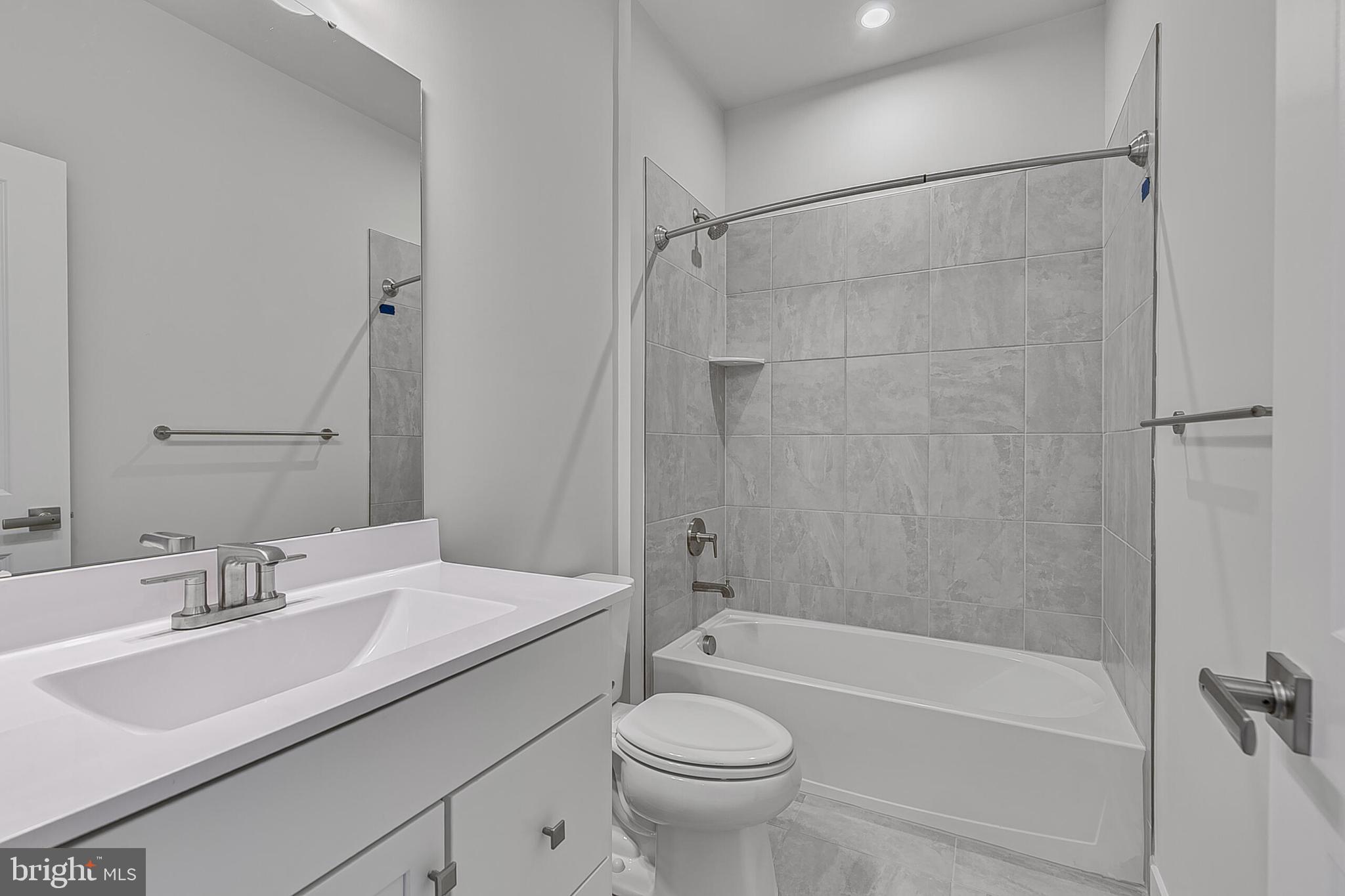 70 C Oasis Avenue Ranson, WV 25438 - Photo 31 of 41 a bathroom with a sink toilet and shower