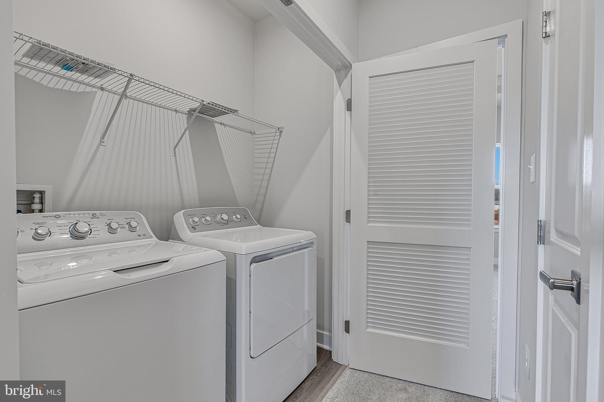70 C Oasis Avenue Ranson, WV 25438 - Photo 32 of 41 a view of bathroom with washer and dryer